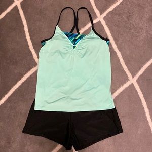 Zero XPosur, women’s swim suit, size large, new without tags.